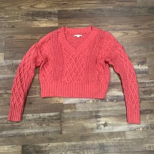 Pink cropped knit sweater